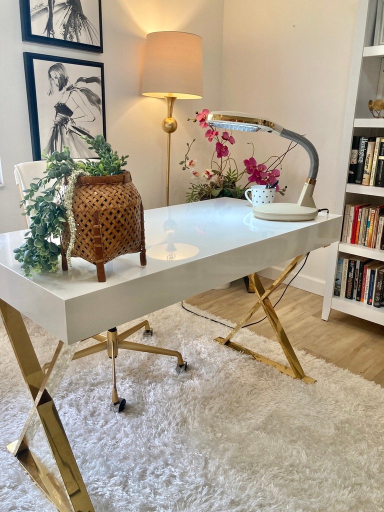 White desk with gold legs in white home office