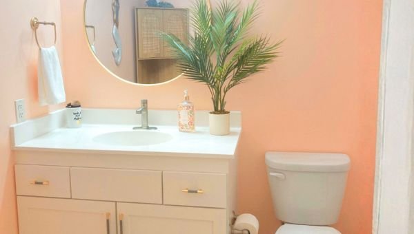 coastal bathroom with peach walls